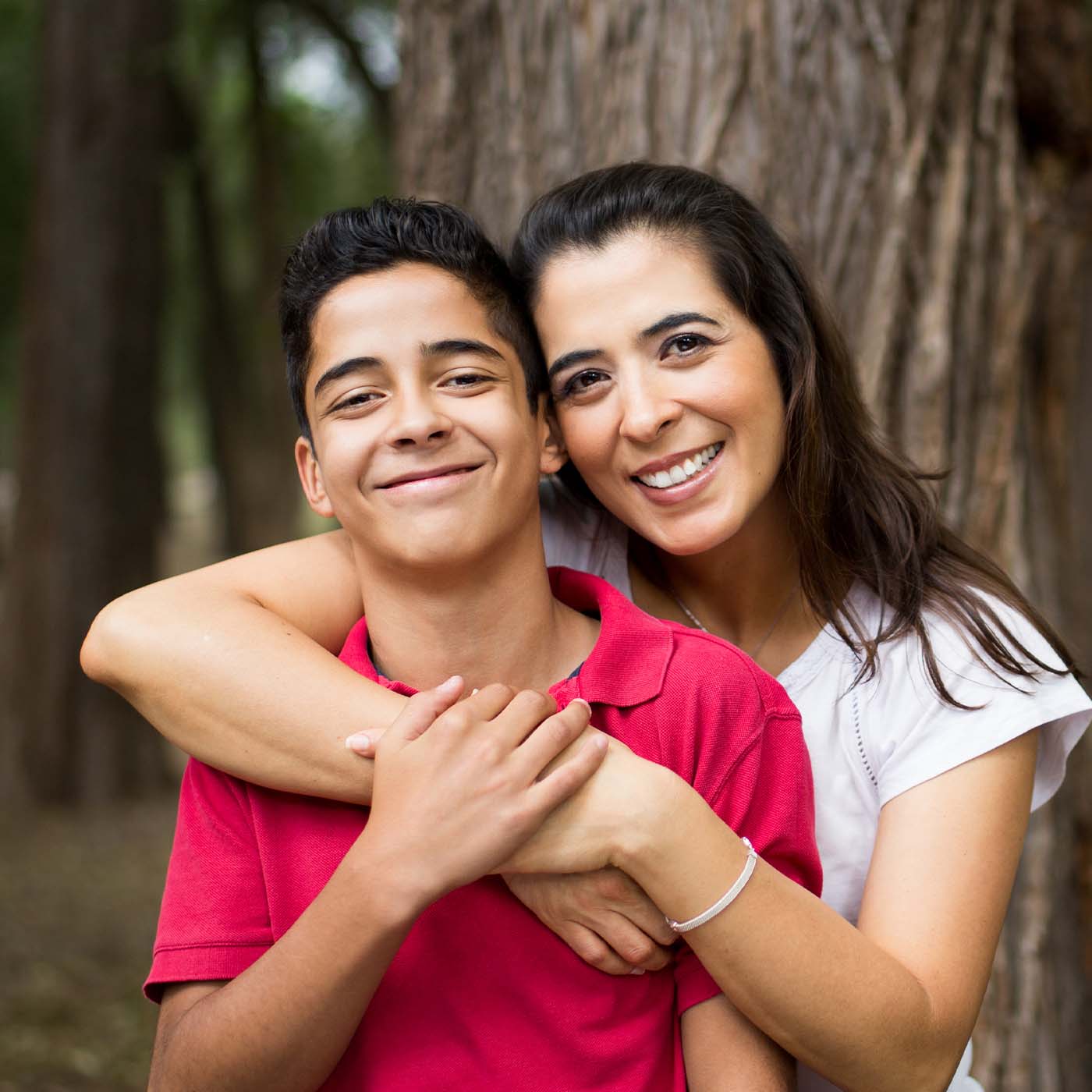 mom smiling with her son-square