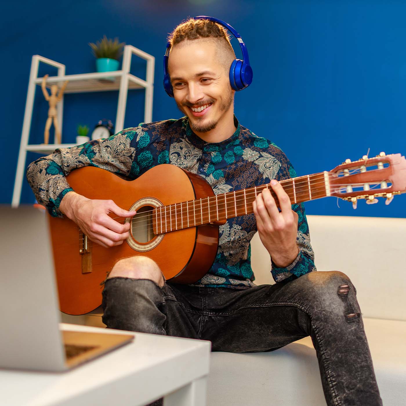 young man playing guitar